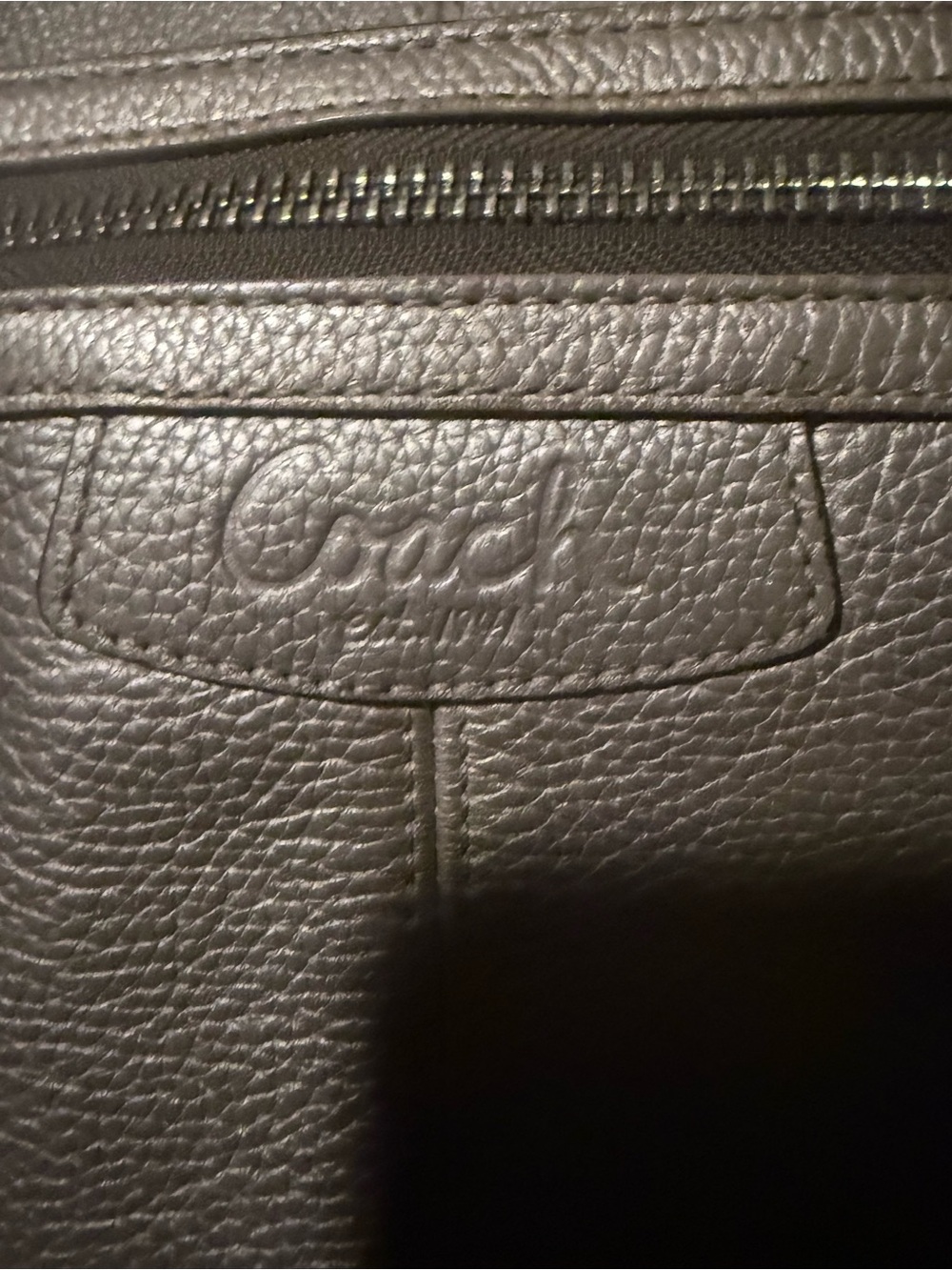 Woman’s large authentic Coach bag silver in good condition